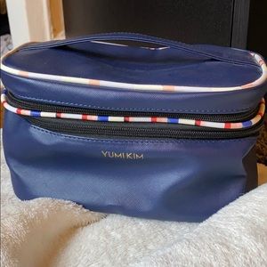 Yumi Kim train case